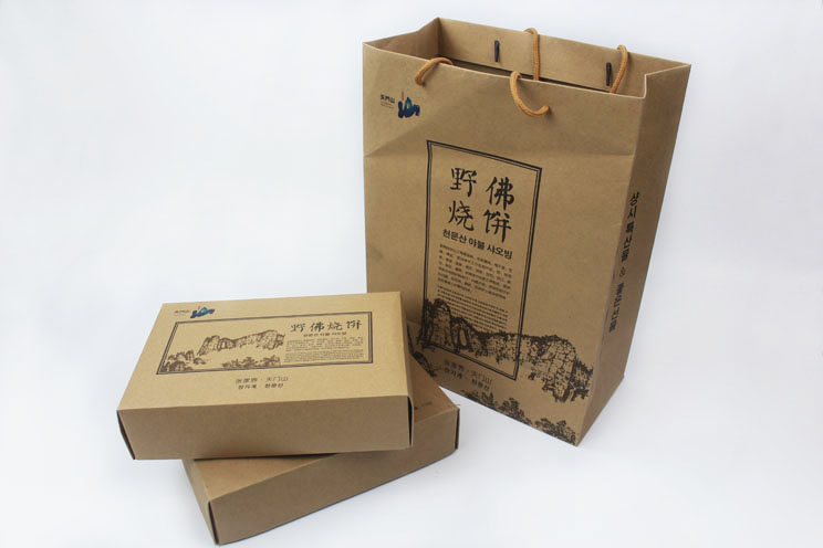 这样原汁原味土特产礼品盒+手提袋套装你也想要吗？快来长沙印刷厂日大彩印定制！